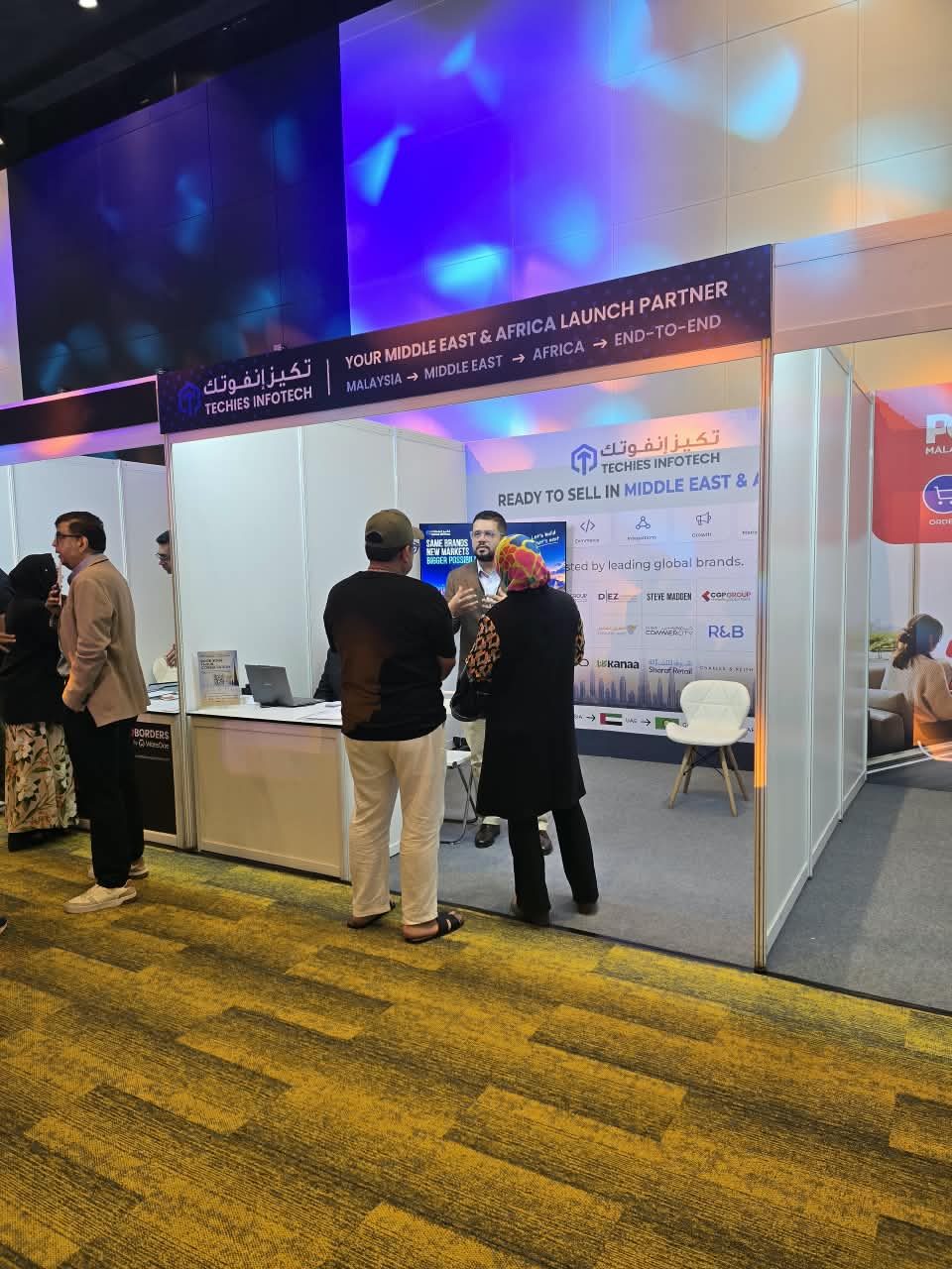 The Techies Infotech exhibition stand — “Your Middle East & Africa launch partner” — at Yalla Commerce 2026.