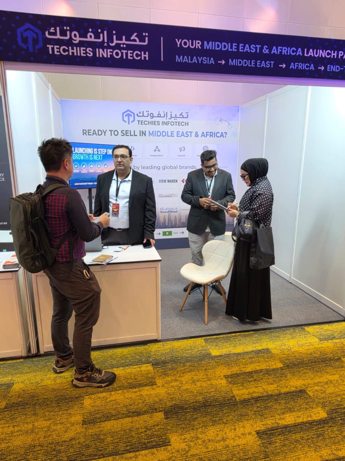 Meeting visitors at the Techies Infotech booth at Yalla Commerce 2026.
